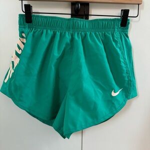 Nike dri-fit women’s size small | emerald green with light pink writing